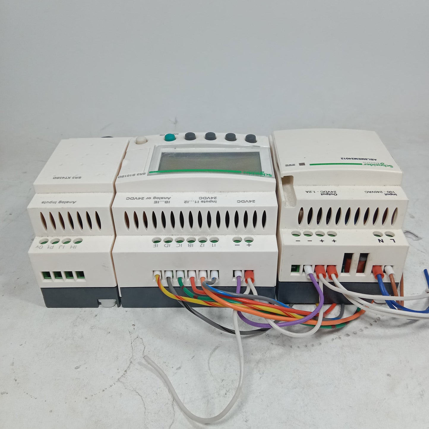 Schneider SR3 B101BD Programmable Logic Controller Module + ABL8MEM24D12 Regulated switch Power Supply in pakistan