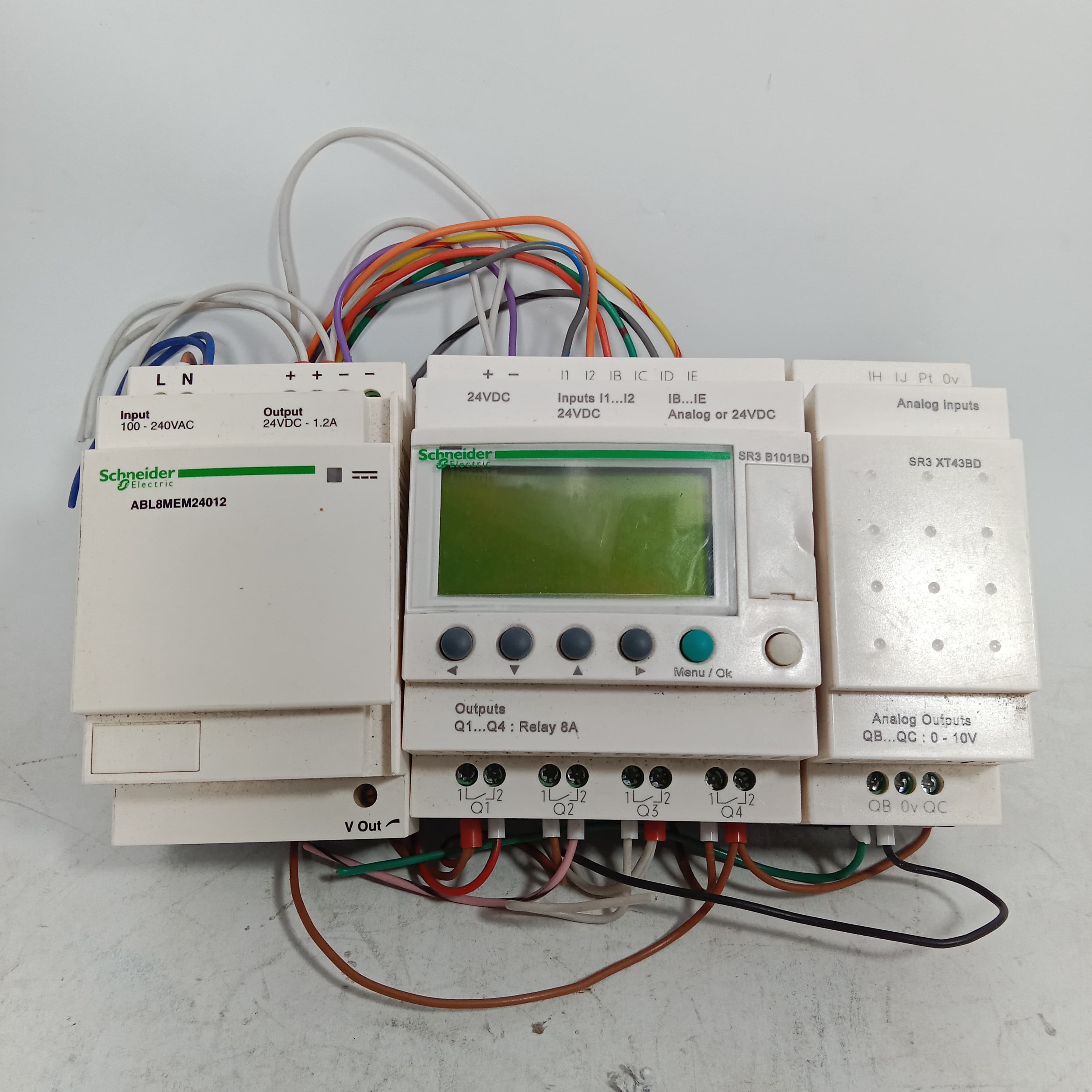 Schneider SR3 B101BD Programmable Logic Controller Module + ABL8MEM24D12 Regulated switch Power Supply in  pakistan