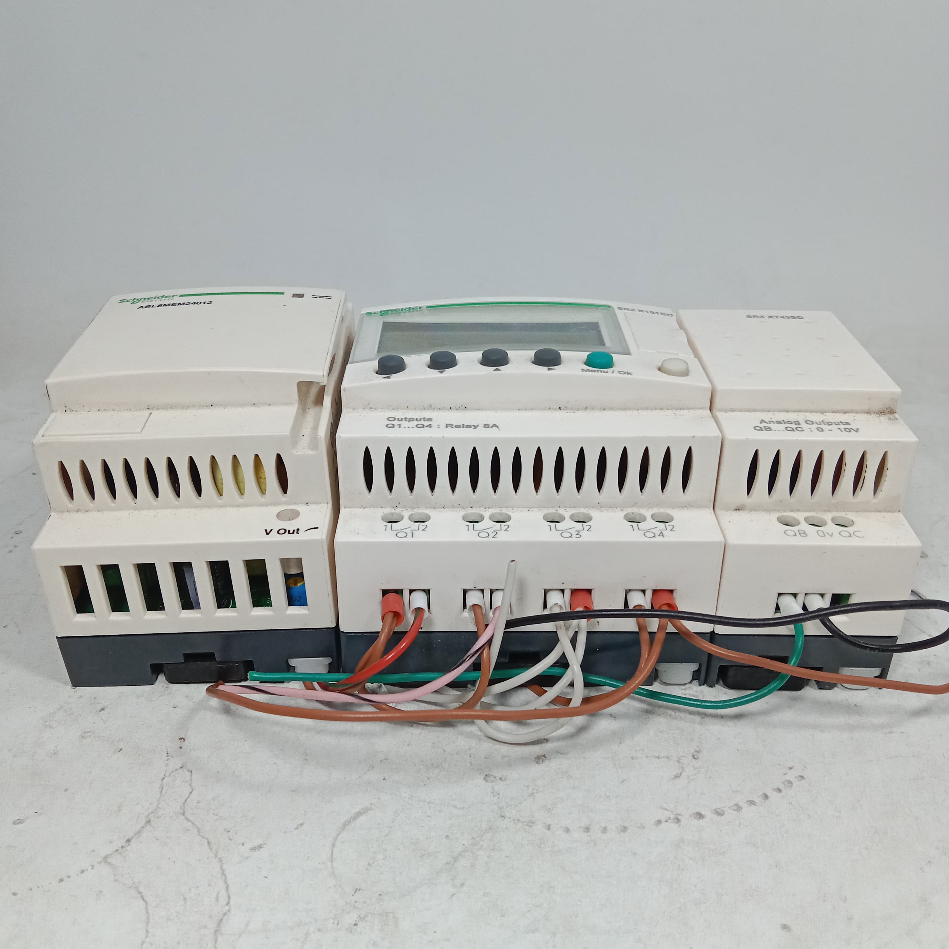 Schneider SR3 B101BD Programmable Logic Controller Module + ABL8MEM24D12 Regulated switch Power Supply in  pakistan