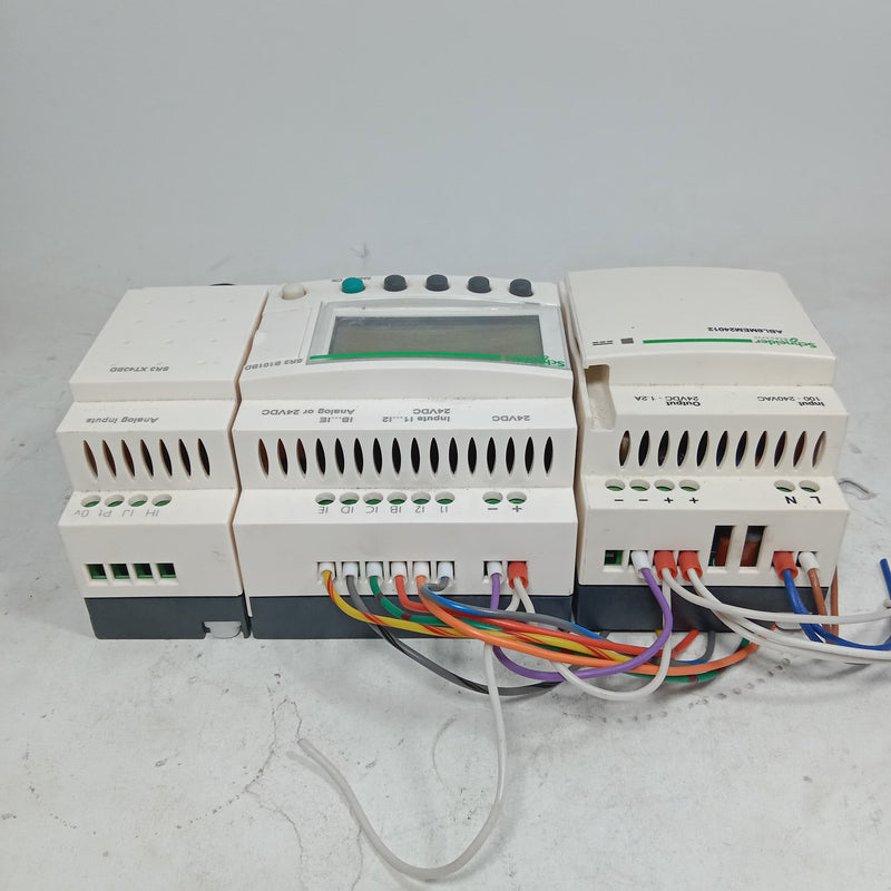 Schneider SR3 B101BD Programmable Logic Controller Module + ABL8MEM24D12 Regulated switch Power Supply in  pakistan