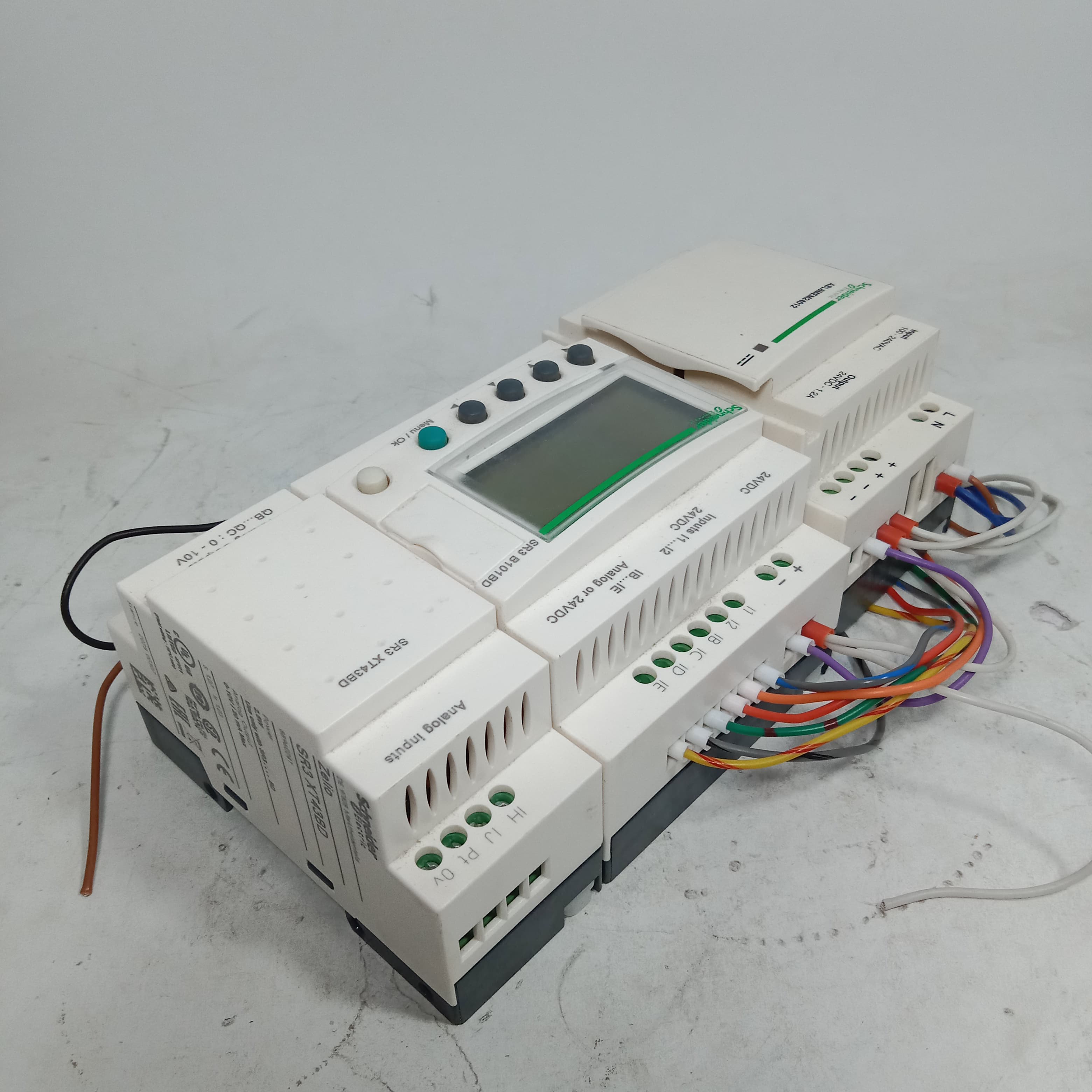 Schneider SR3 B101BD Programmable Logic Controller Module + ABL8MEM24D12 Regulated switch Power Supply in  pakistan